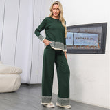 Completo versatile da donna composto da top girocollo in jacquard e pantaloni a gamba larga