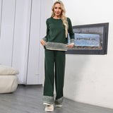 Completo versatile da donna composto da top girocollo in jacquard e pantaloni a gamba larga