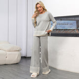 Completo versatile da donna composto da top girocollo in jacquard e pantaloni a gamba larga