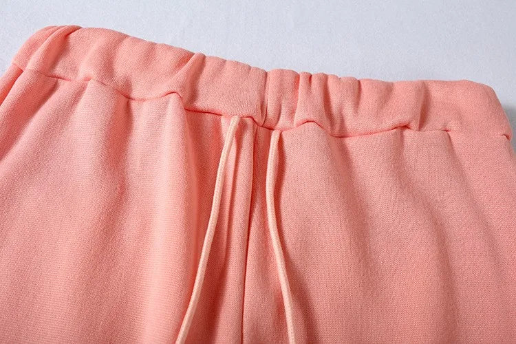 Completo sportivo da donna in tinta unita, casual, alla moda, con maniche lunghe, pantaloni larghi e stile streetwear.